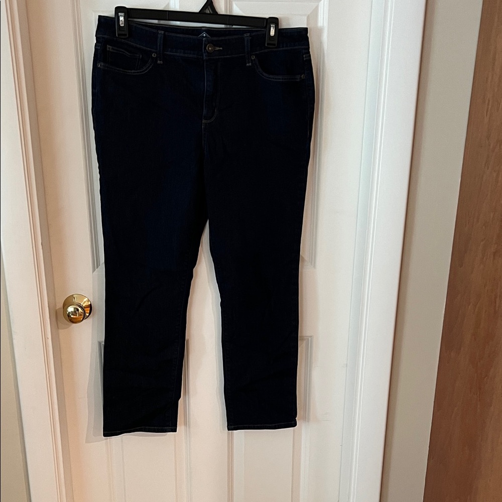 St. John’s Bay, woman’s, “straight leg” dark blue jeans. Size 14S.